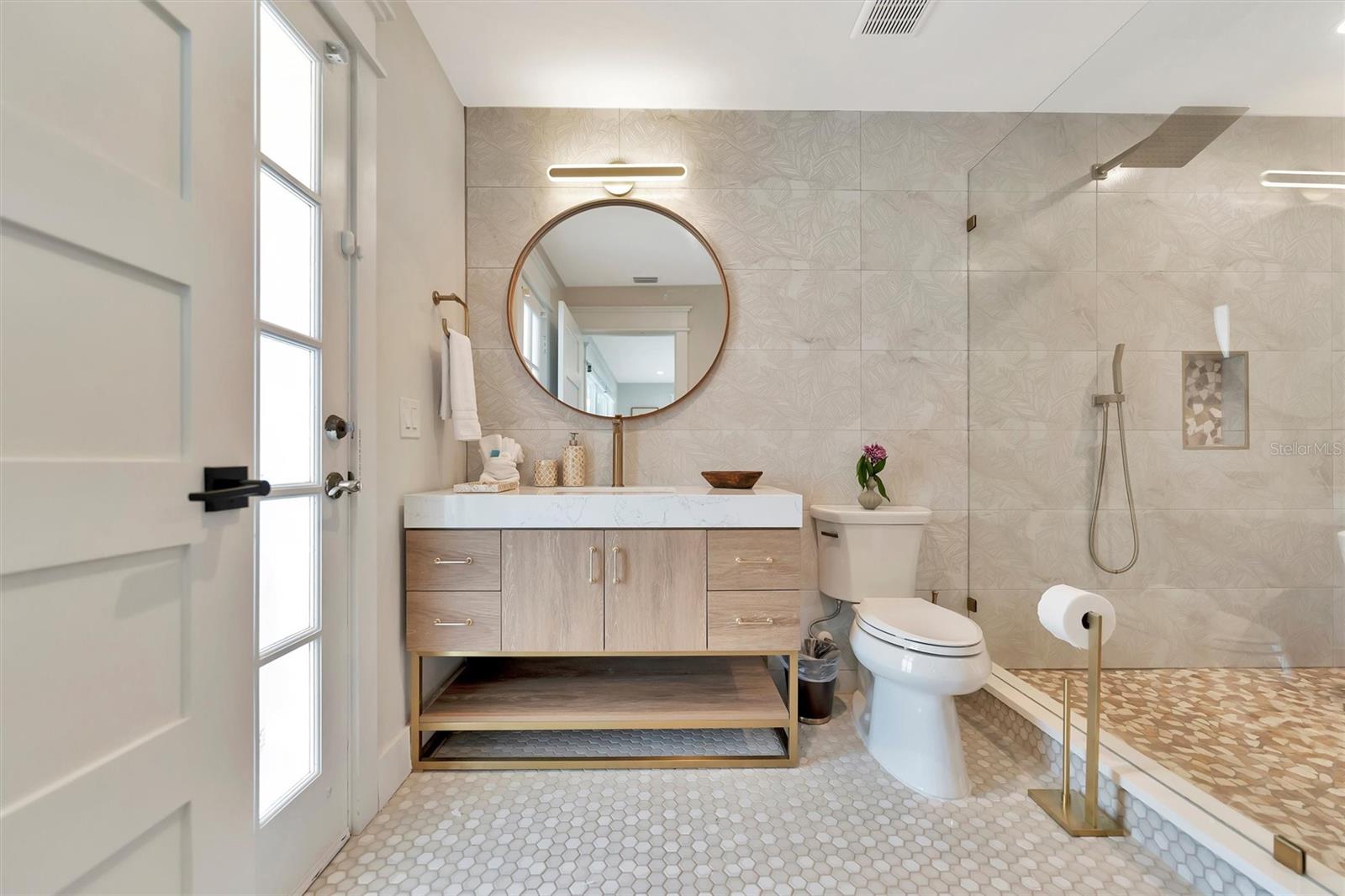 Direct access to the lanai and heated saltwater pool.