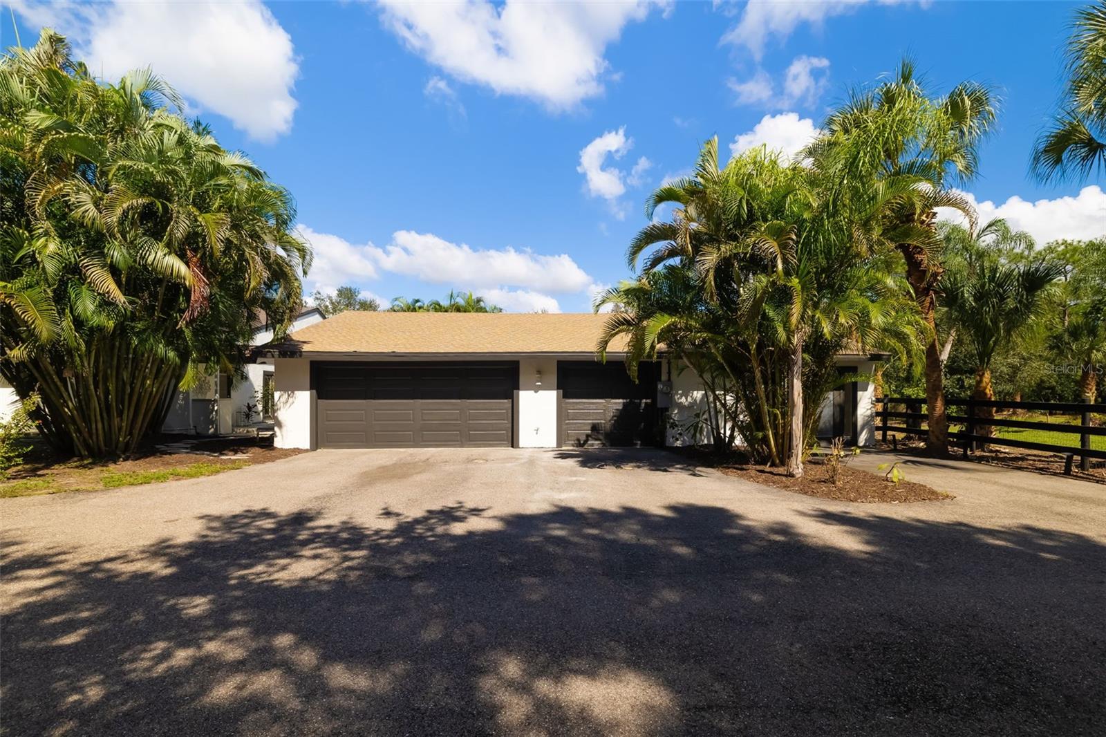 CAR ENTHUSIASTS TAKE NOTEthis substantial extended three-car garage provides exceptional space for vehicles, storage, tools, hobbies and more.