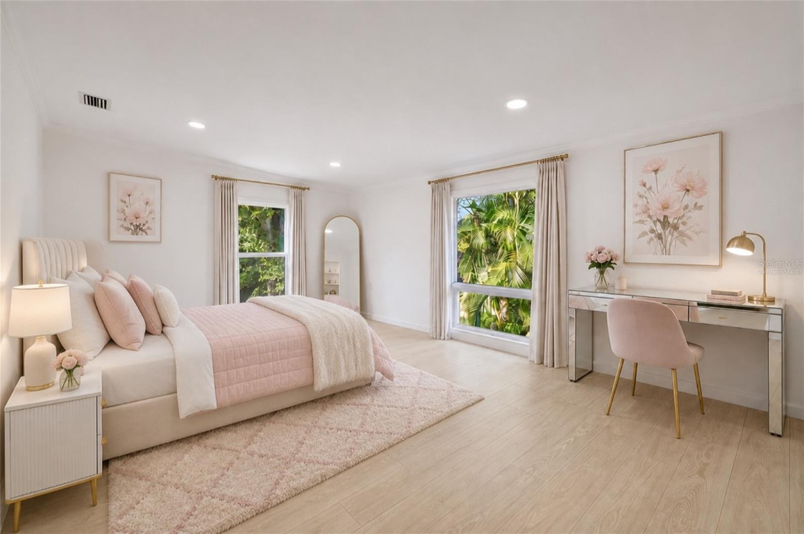 VIRTUALLY STAGED  Spacious upstairs primary bedroom shown with conceptual furnishings to illustrate the rooms generous scale and possibilities.