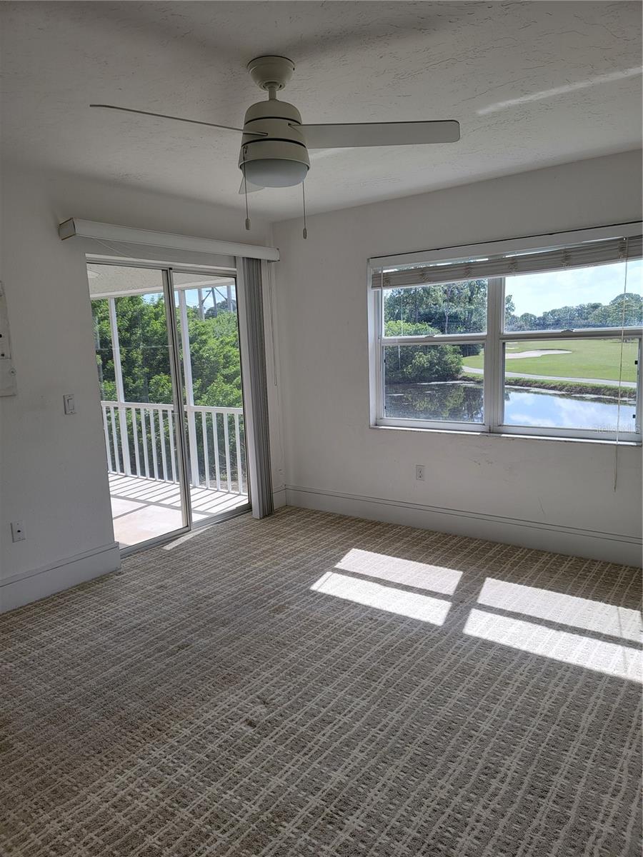 Wake up in the primary bedroom to a peaceful vista