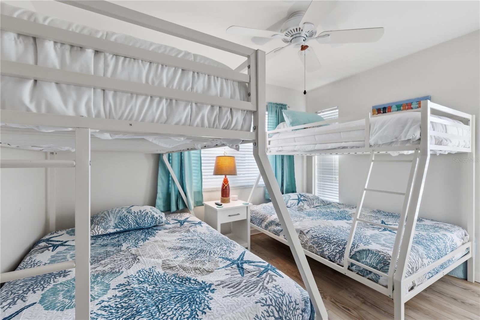 Bedroom 2 with two twin over full size bunk beds.