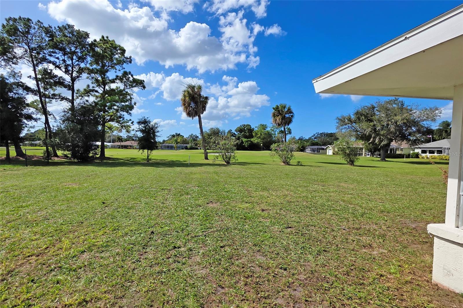 Yard and Golf Course views 1