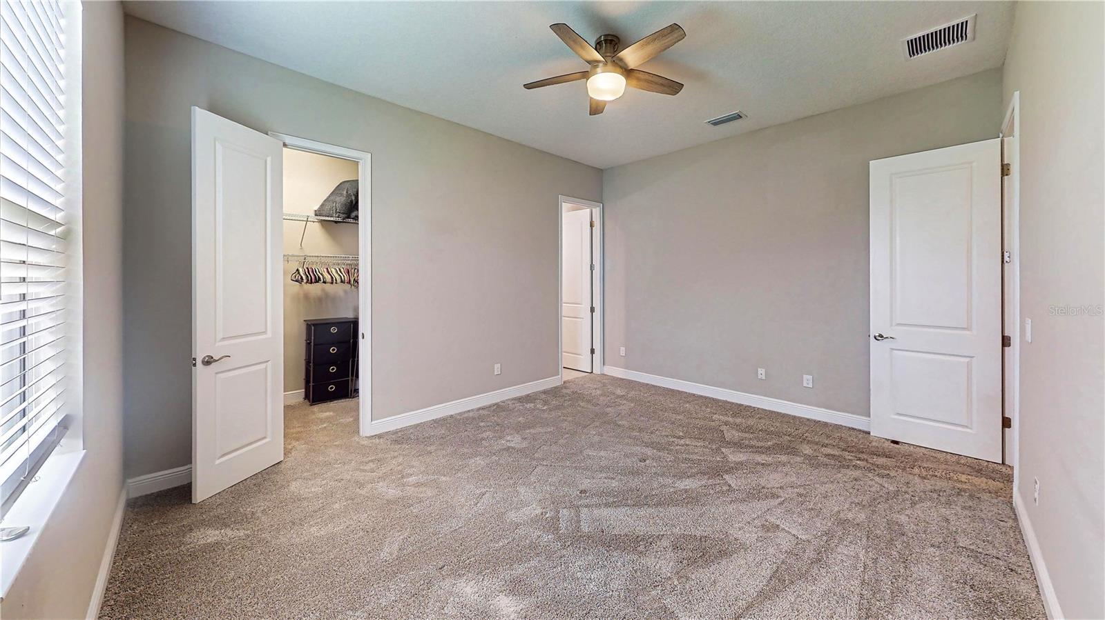 Bedroom 3 with en-suite bathroom and walk-in closet