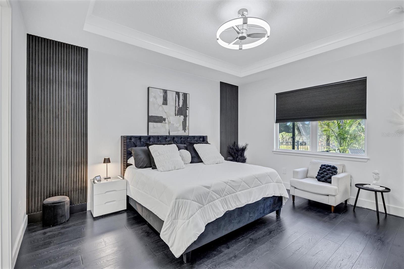Beautiful Primary Bedrrom - Upgraded Wall Decor, Flooring, Lighting and more! Beautiful Primary Bedrrom - Upgraded Wall Decor, Flooring, Lighting and more!