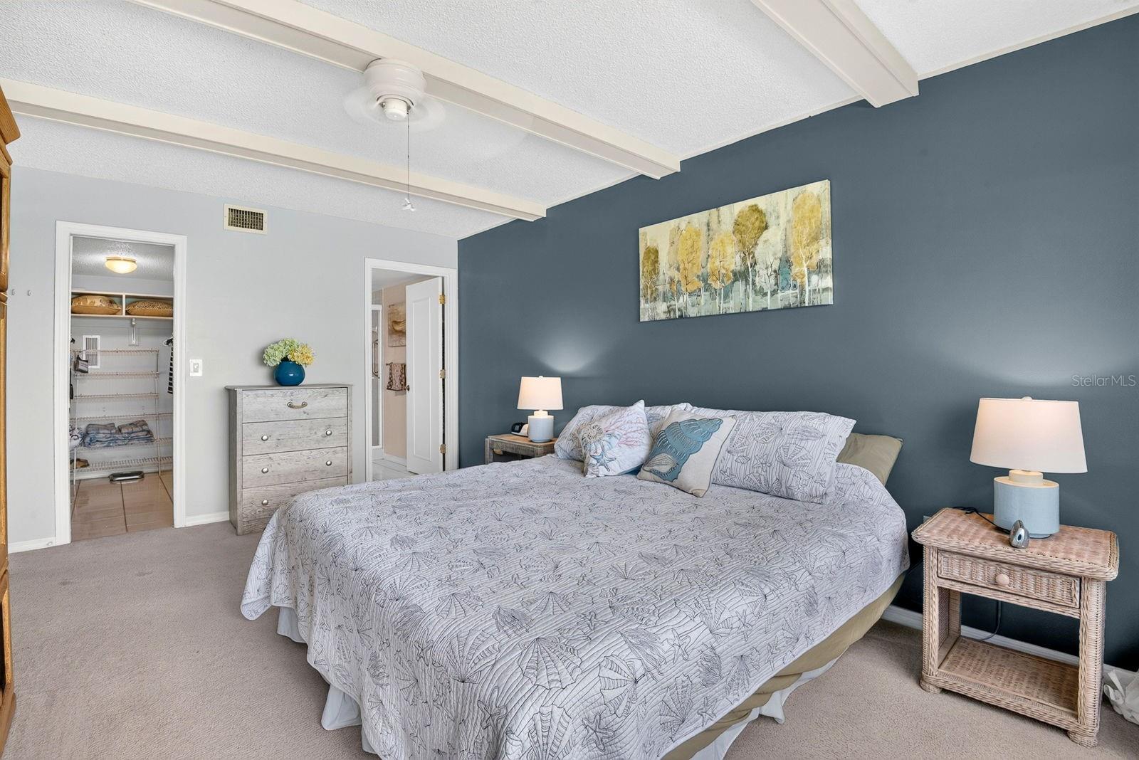 Master bedroom facing into master bath and closet