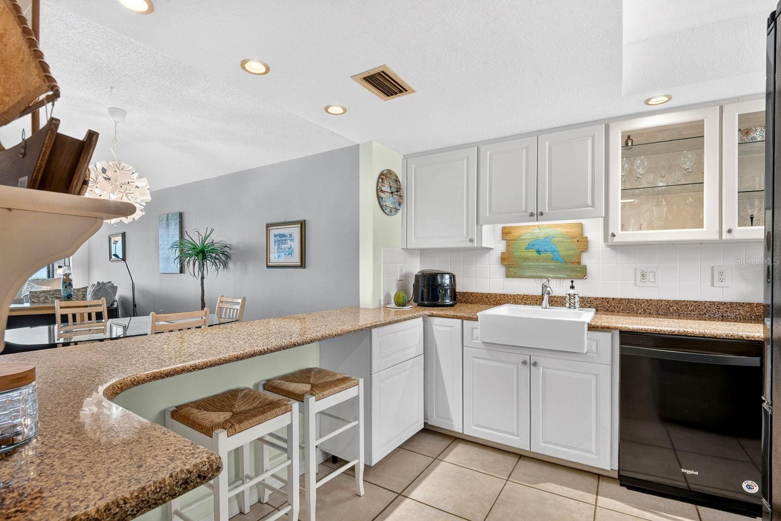 Kitchen overlooking breakfast bar Kitchen overlooking breakfast bar