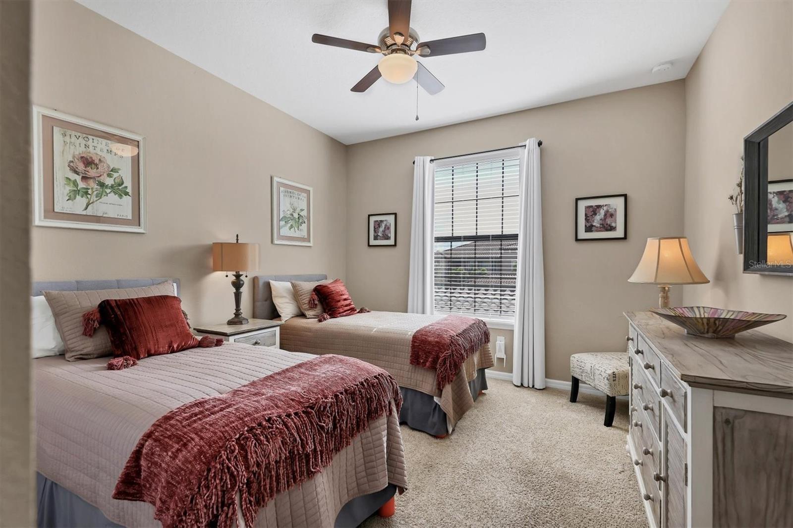 Guest bedroom with two  beds