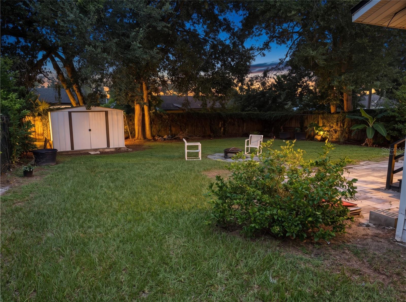 Back yard from left side"Virtually staged"
