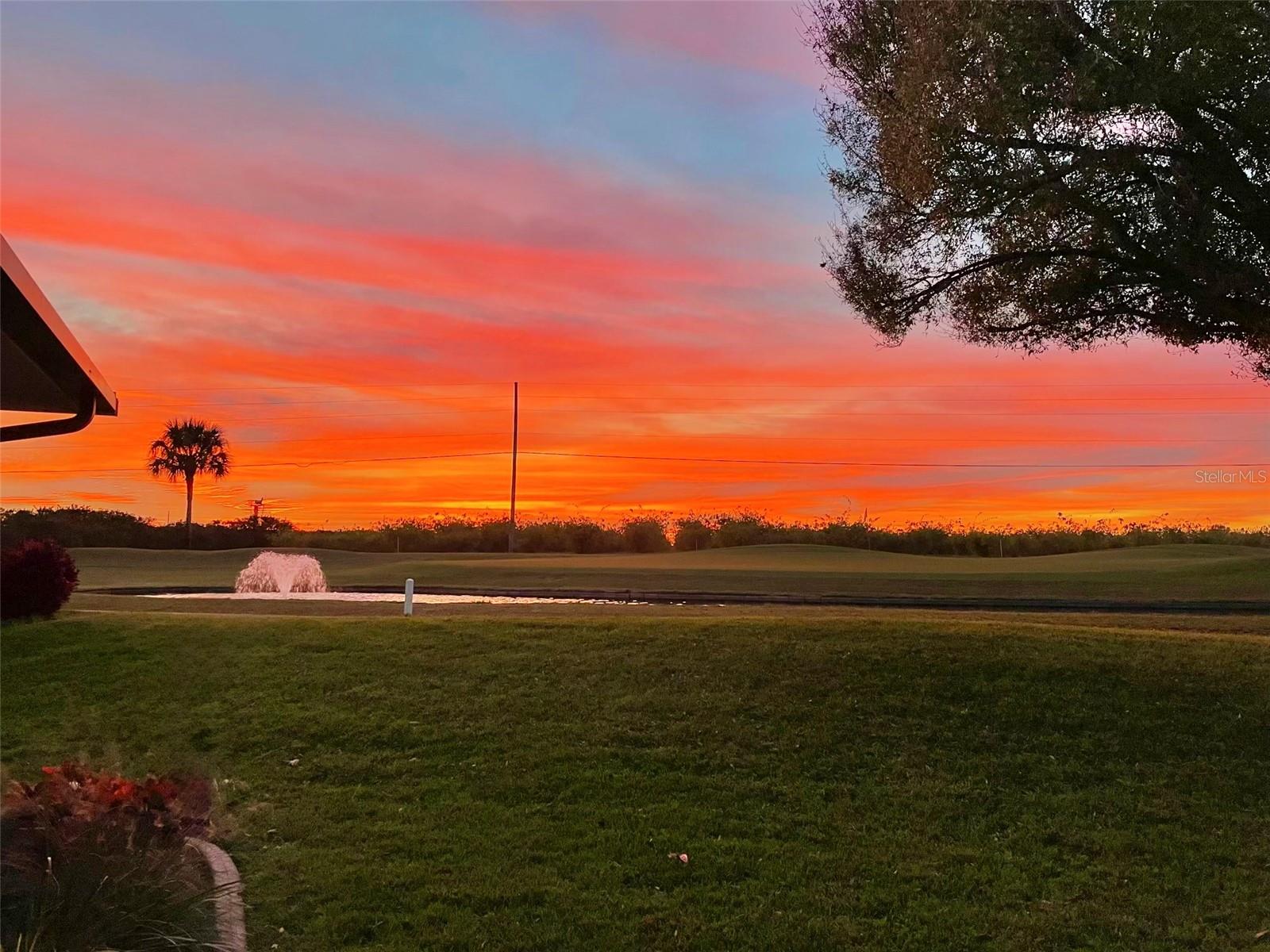 Sunset overlooking golf course from the pool deck