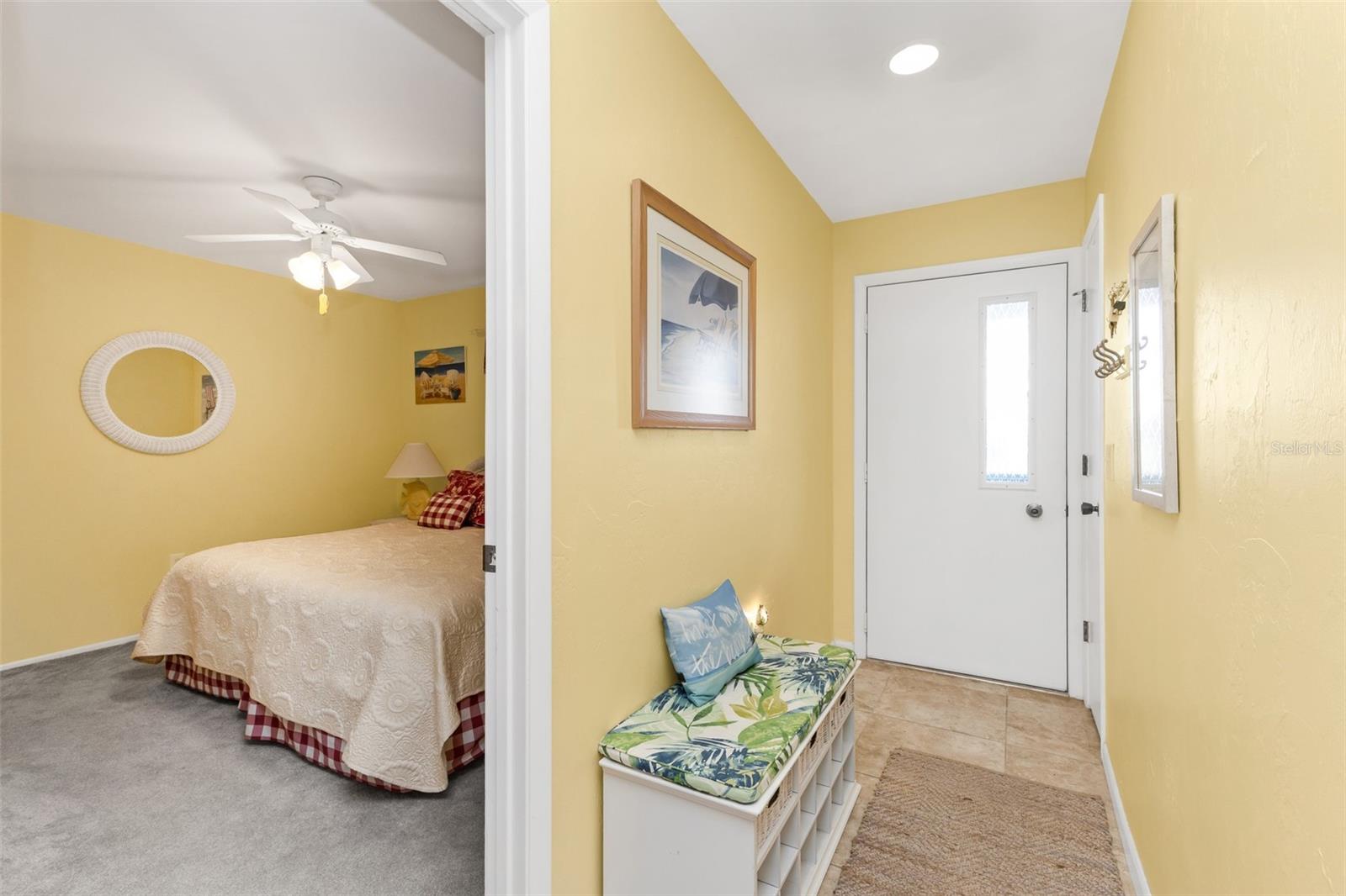 Thoughtfully separated from the primary suite, the front guest bedroom offers added privacy and a comfortable retreat for visiting family and friends.