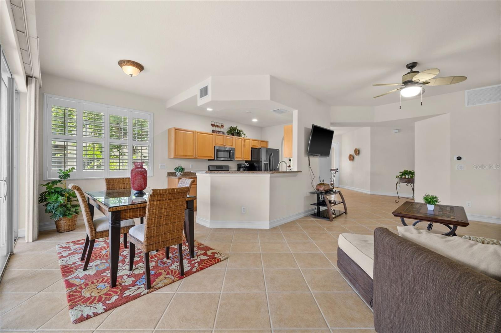 Evening View of the Living Room and Kitchen