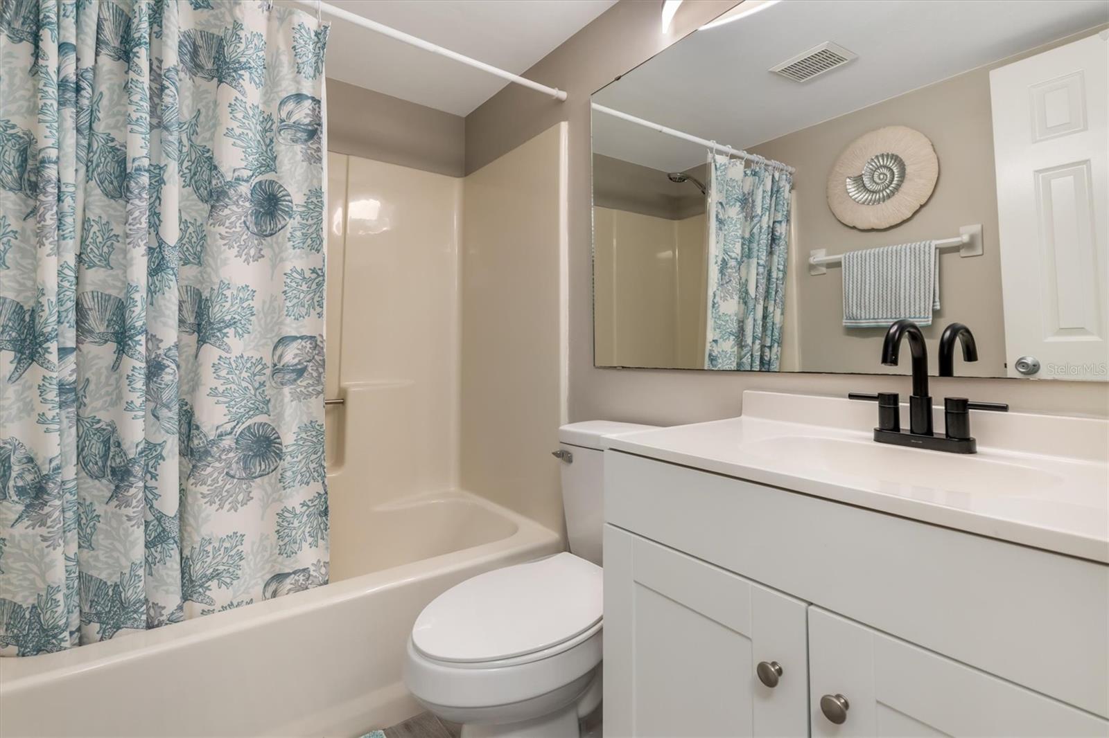 SECOND BATH WITH TUB SHOWER