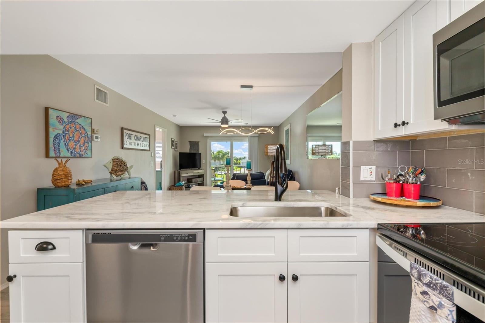 SOFT CLOSE SOLID WOOD CABINETS AND ON TREND HARDWARE