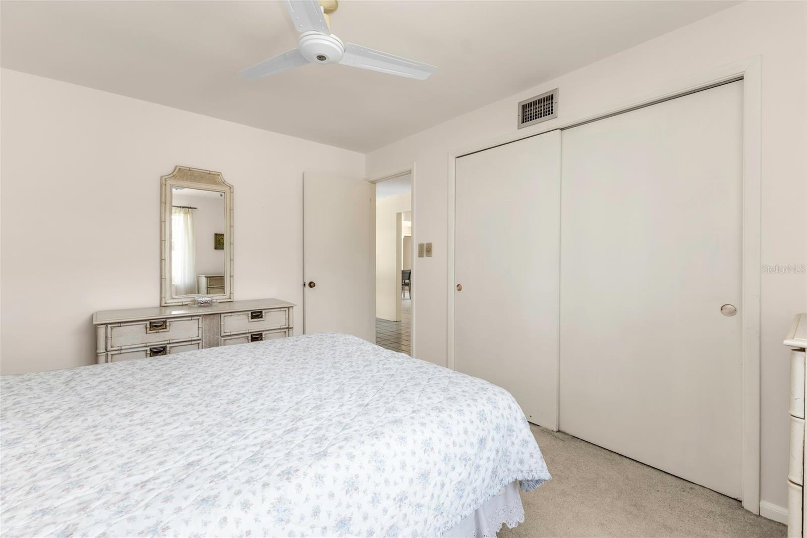 Bedroom 2 - Large closet for storage, clothes, etc., large window and ceiling fan.