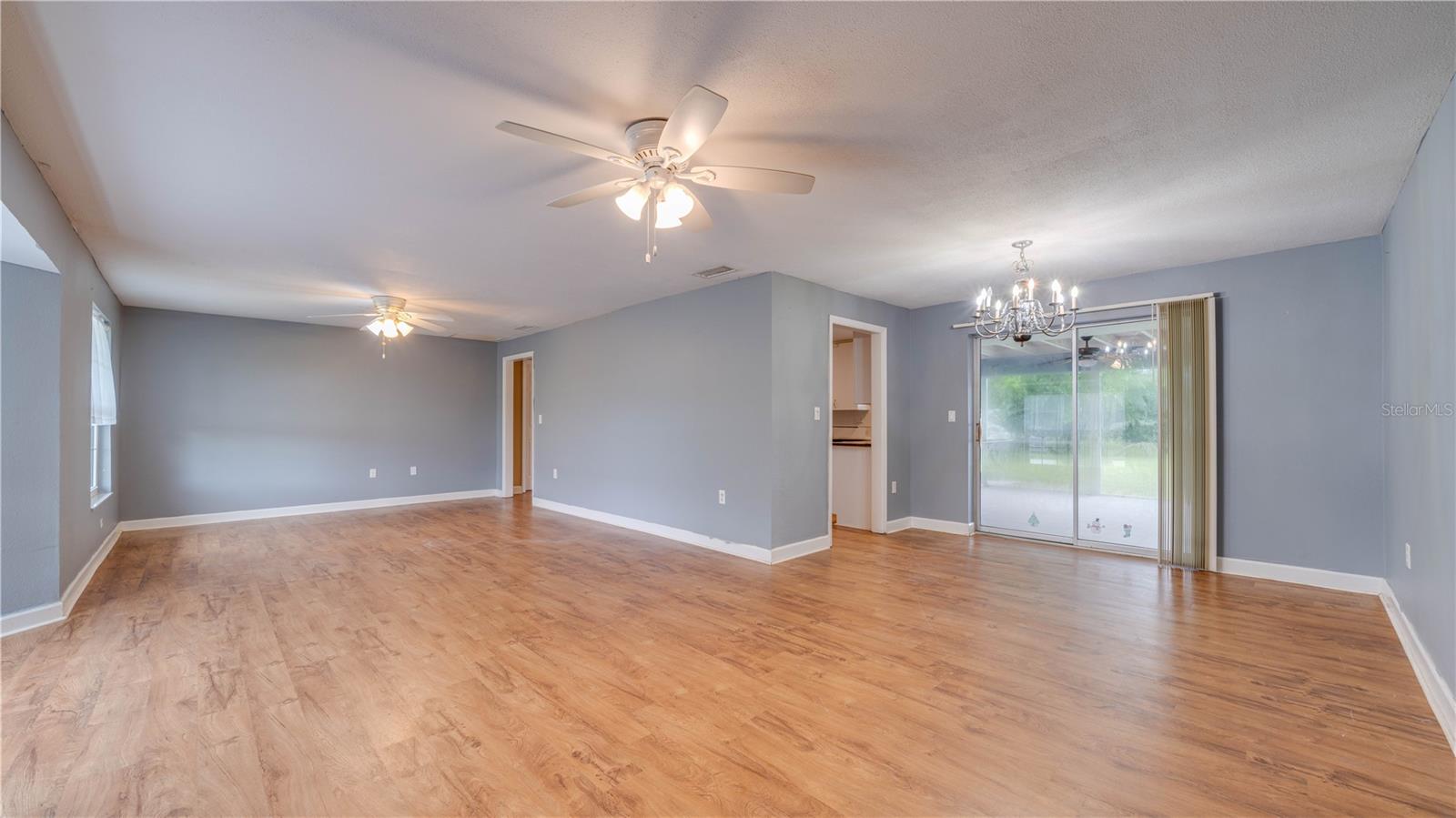 An expansive family room and a designated dining area.