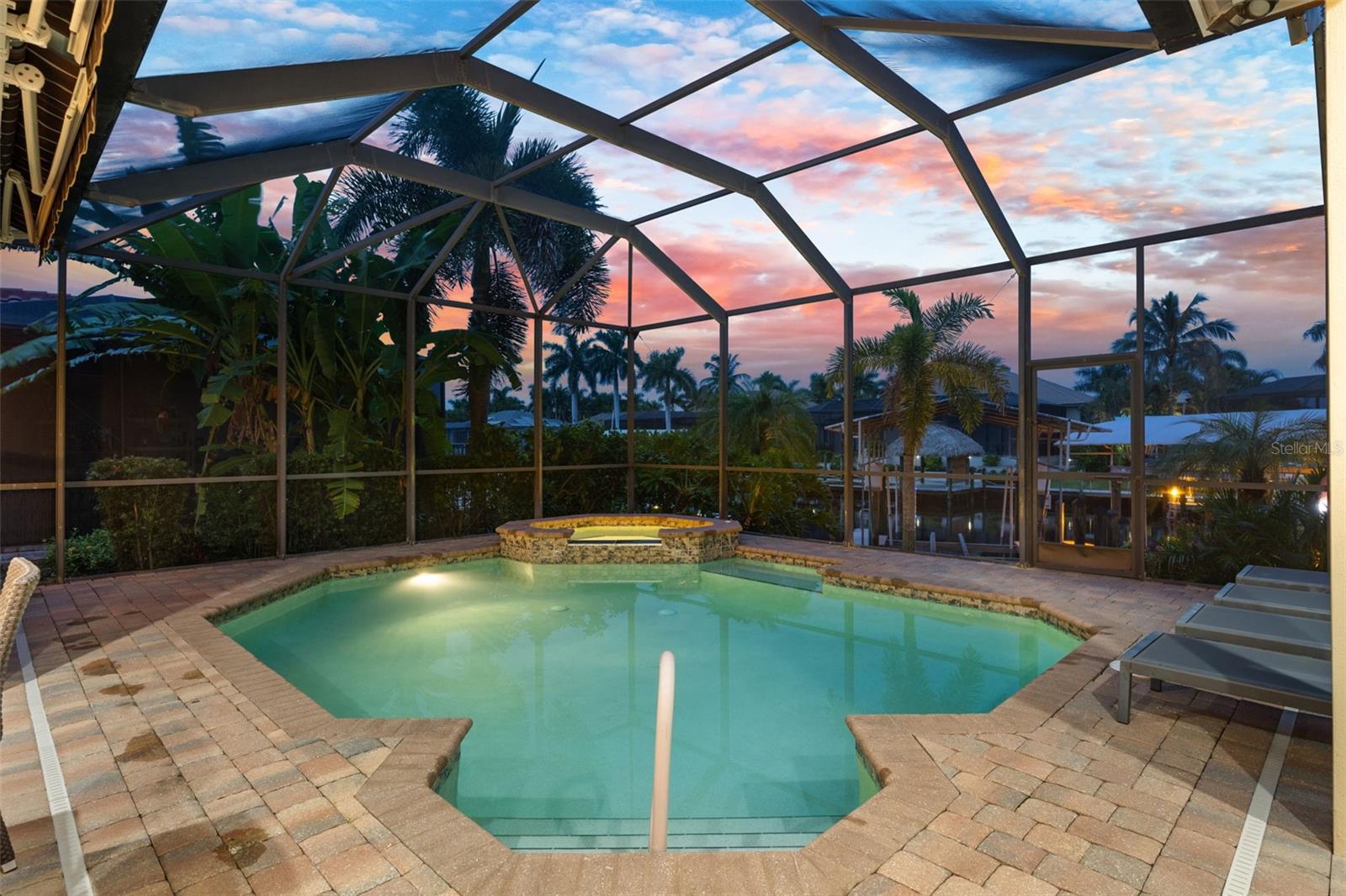 Heated pool is screened for comfortable evenings