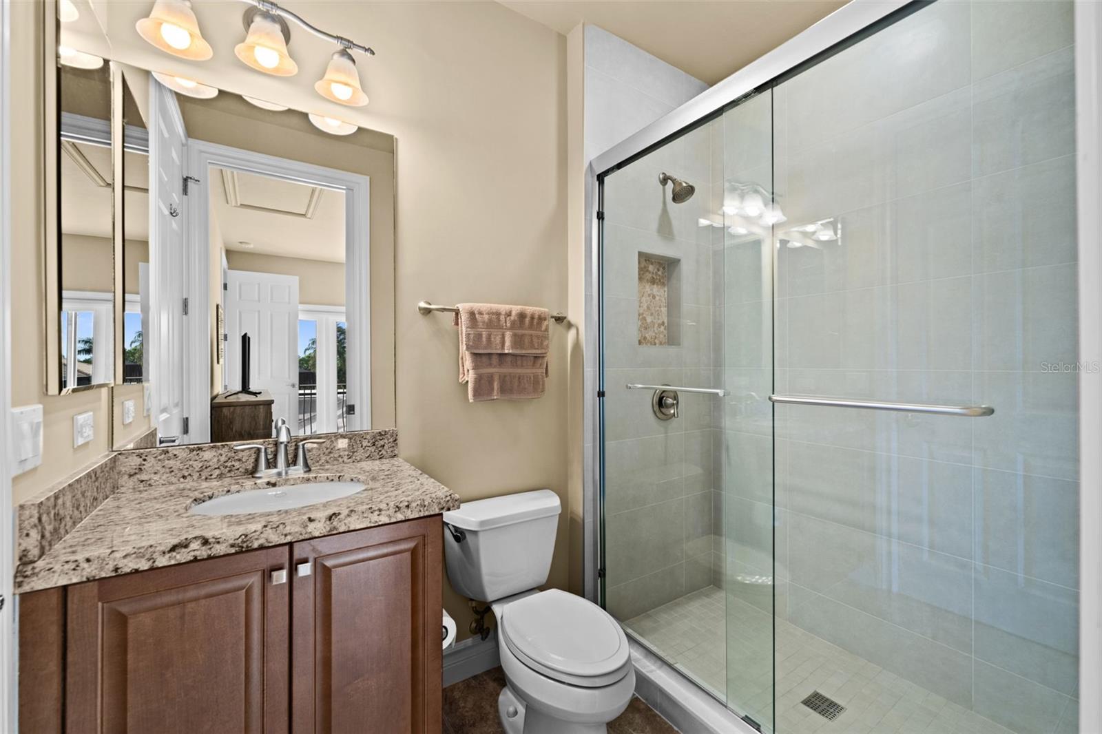 Full bath upstairs attached to 3rd bedroom
