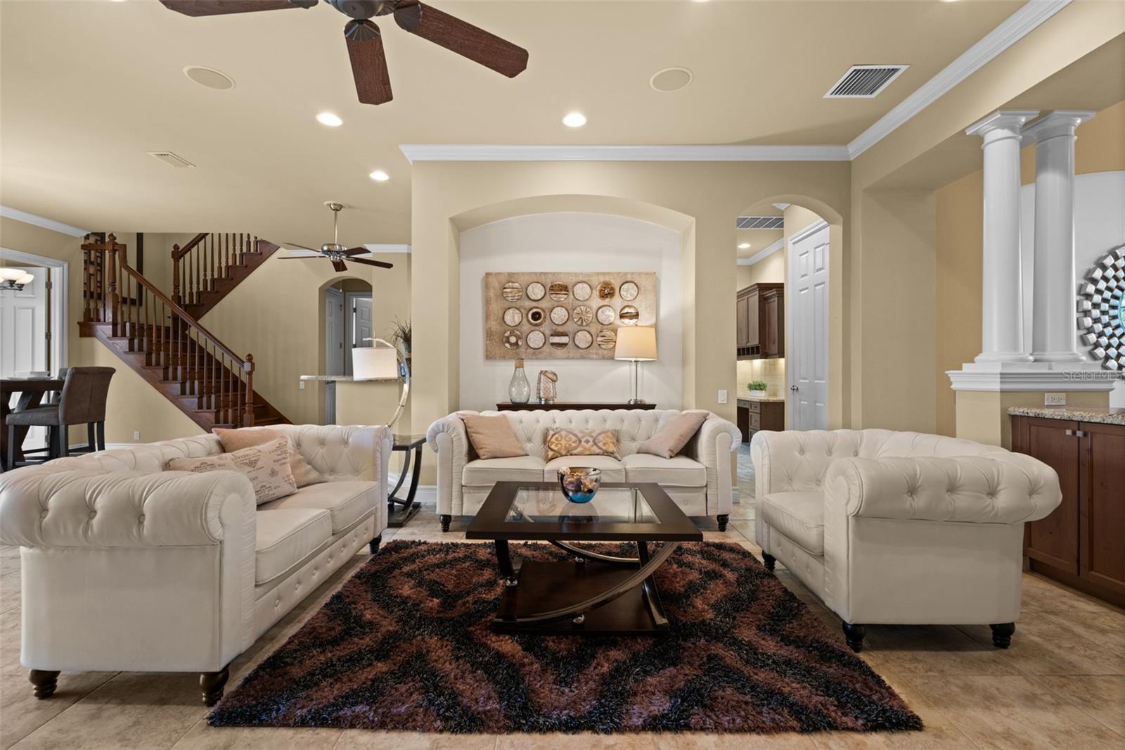 Great room with custom arches and crown molding