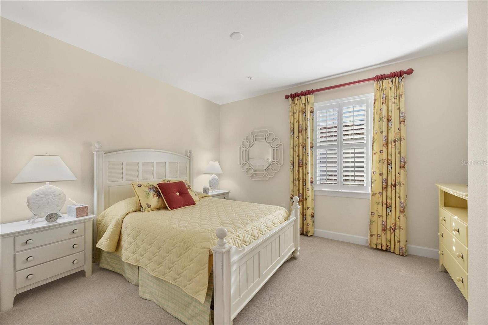 Bedroom two - custom bedding and window treatment. Newer plush carpeting