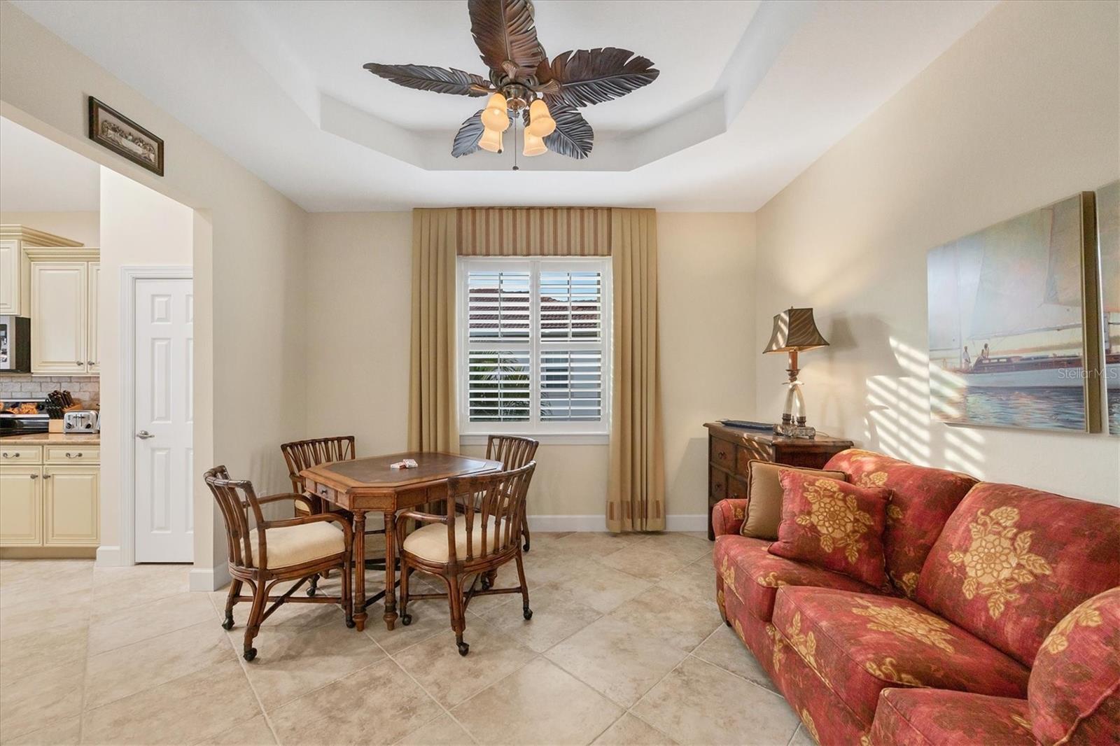 Dining Room - Custom upholstered sleeper/sofa and card table.
