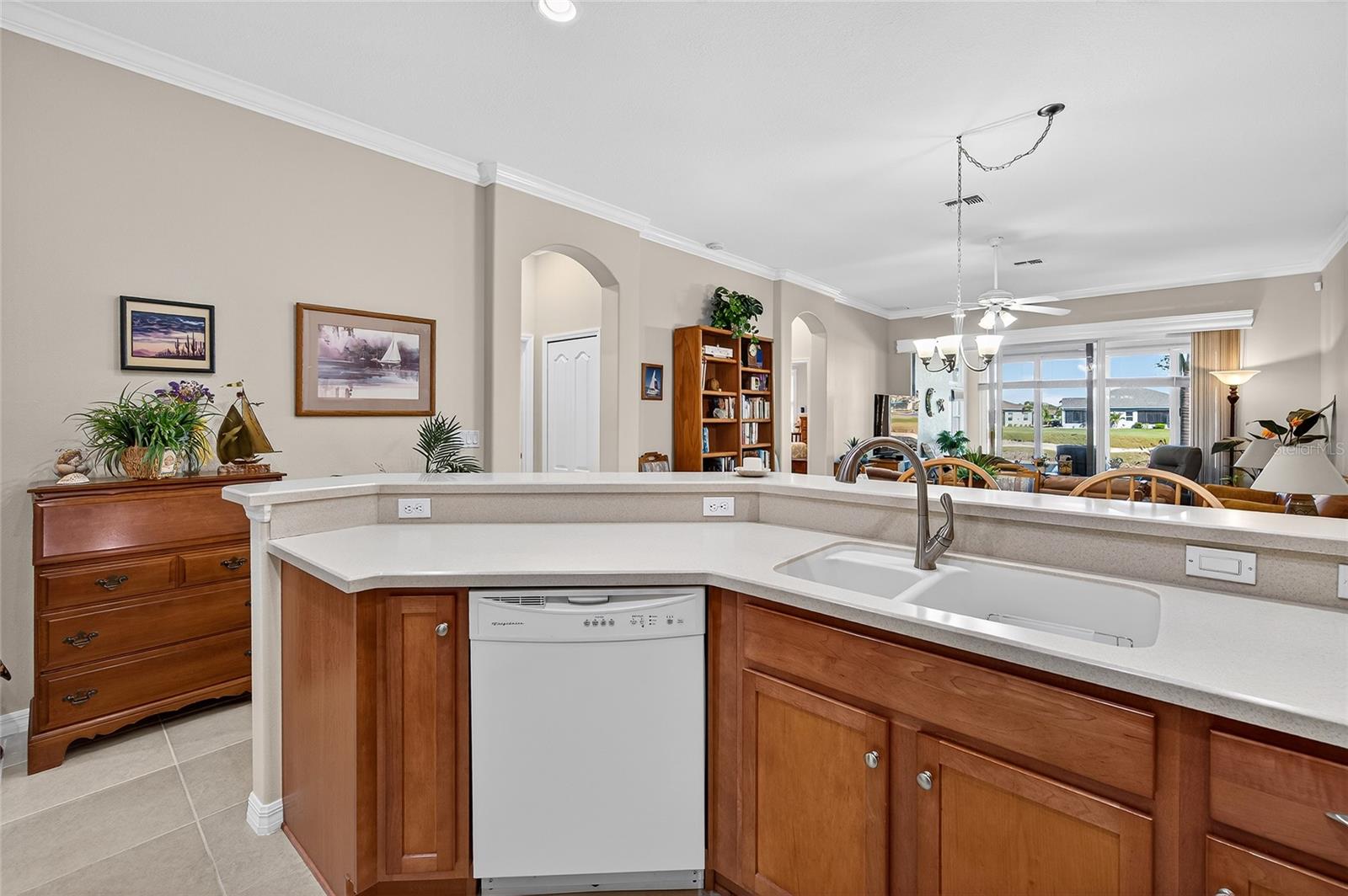 Kitchen island looking out to the beautiful lake and lanai.