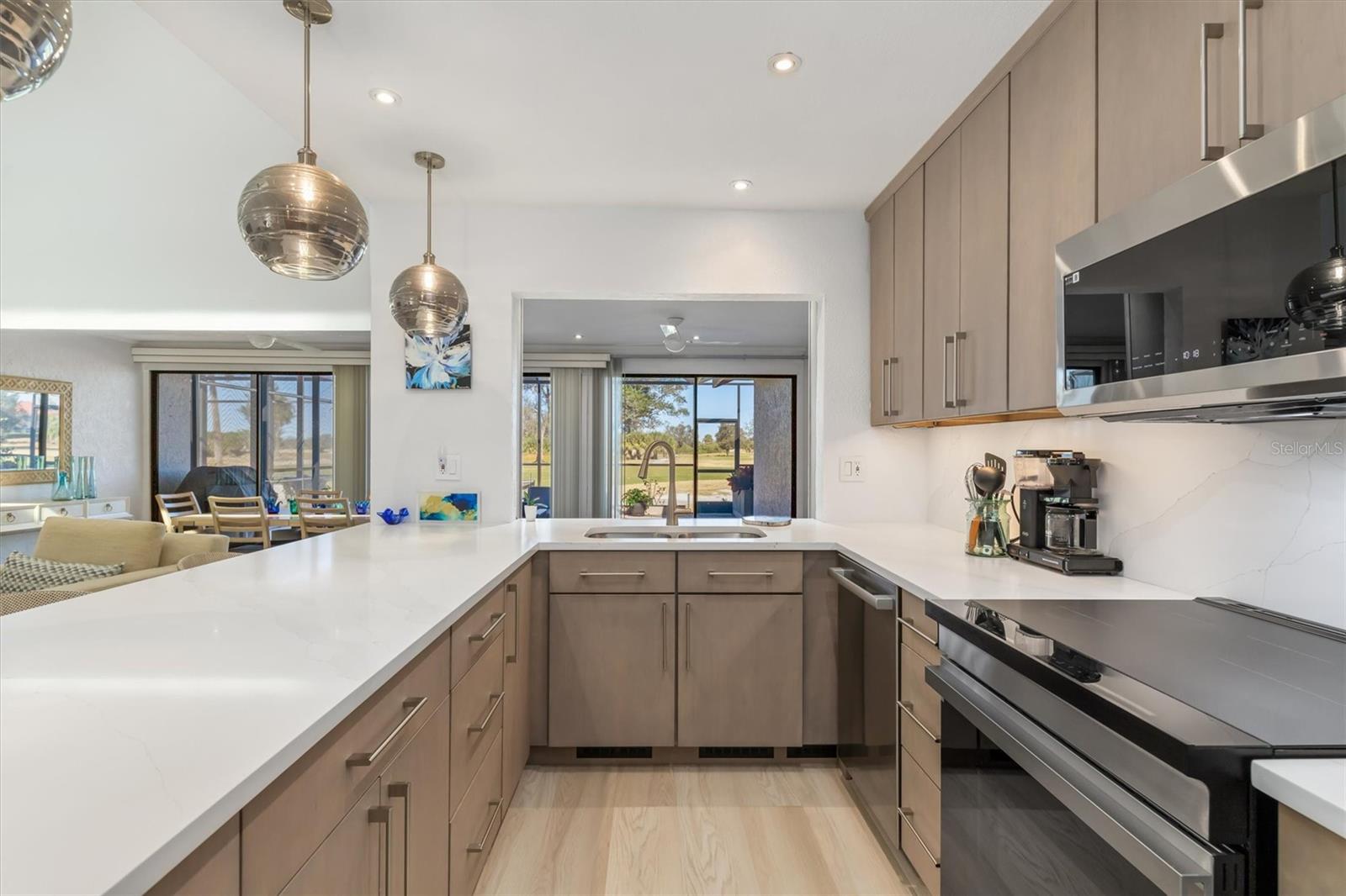 Open to dining/family room with views of golf course.