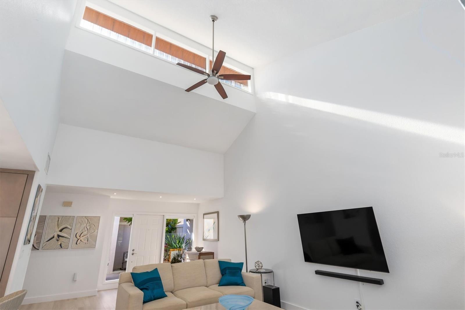 Notice soaring 17 foot ceiling