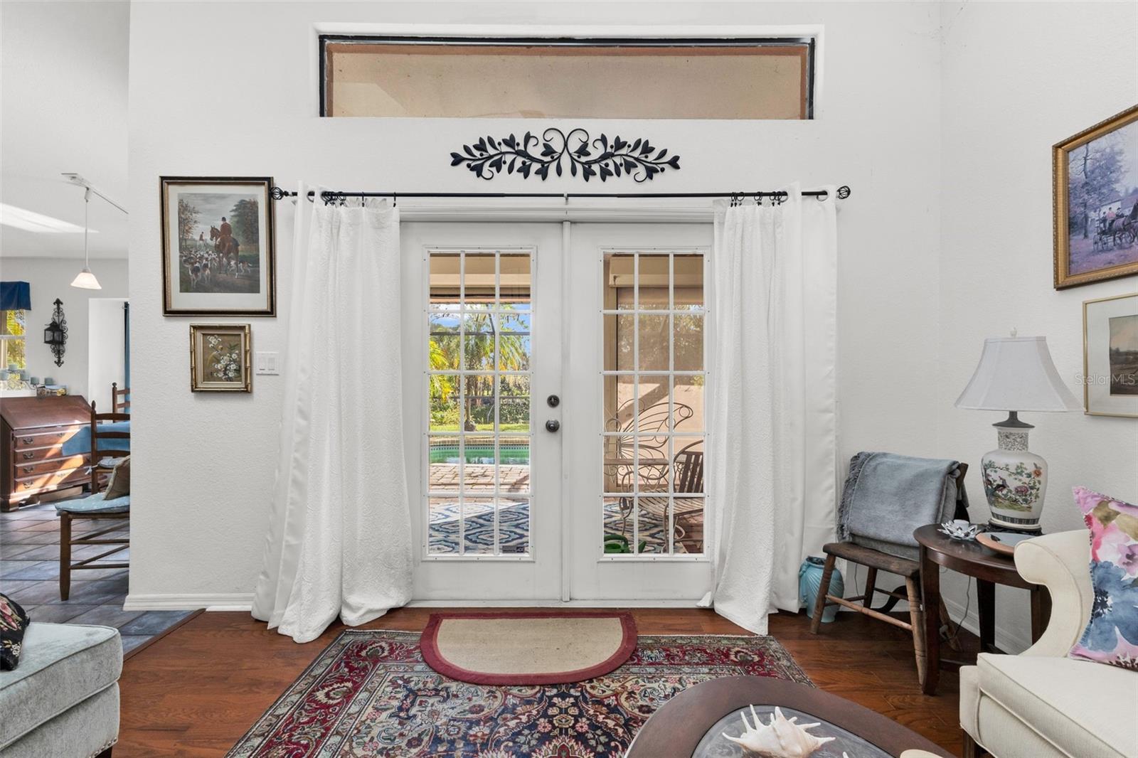 FORMAL LIVING ROOM WITH FRENCH DOORS FORMAL LIVING ROOM WITH FRENCH DOORS