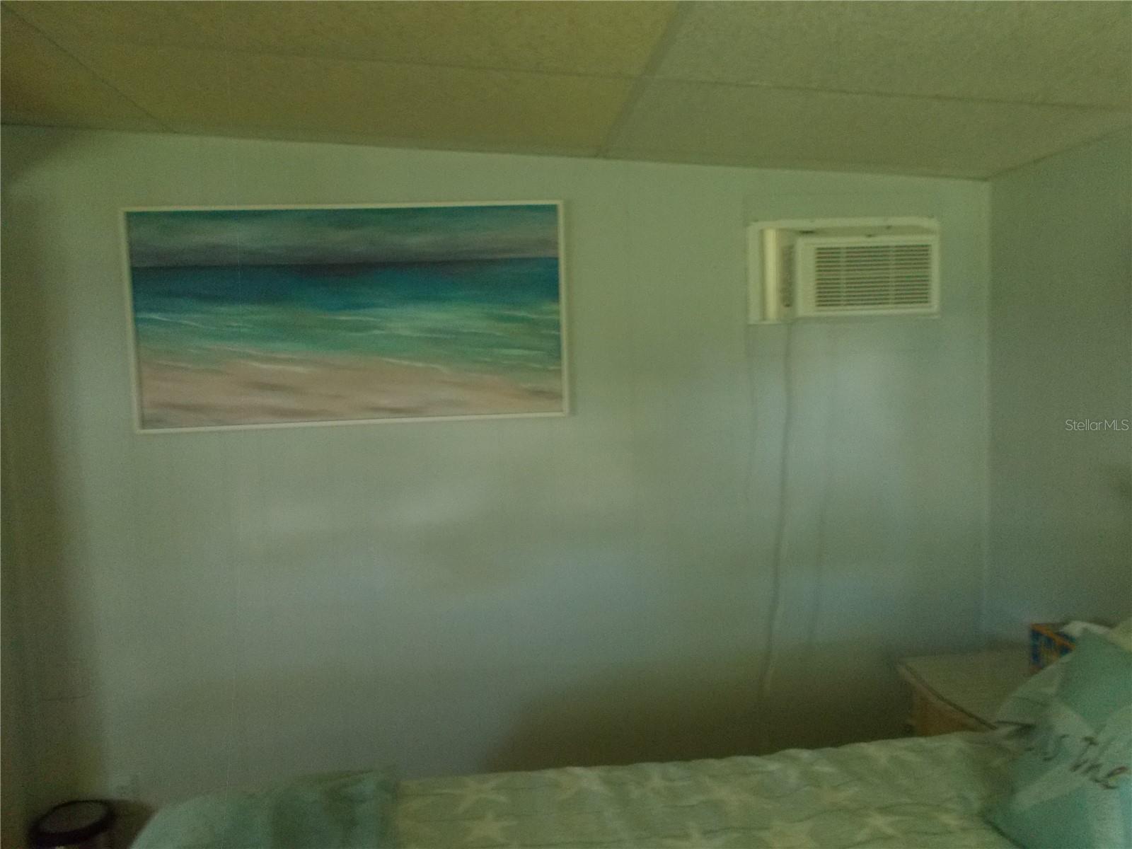 Primary Bedroom showing wall AC