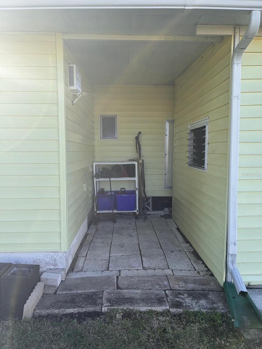 Walkway between house and shed