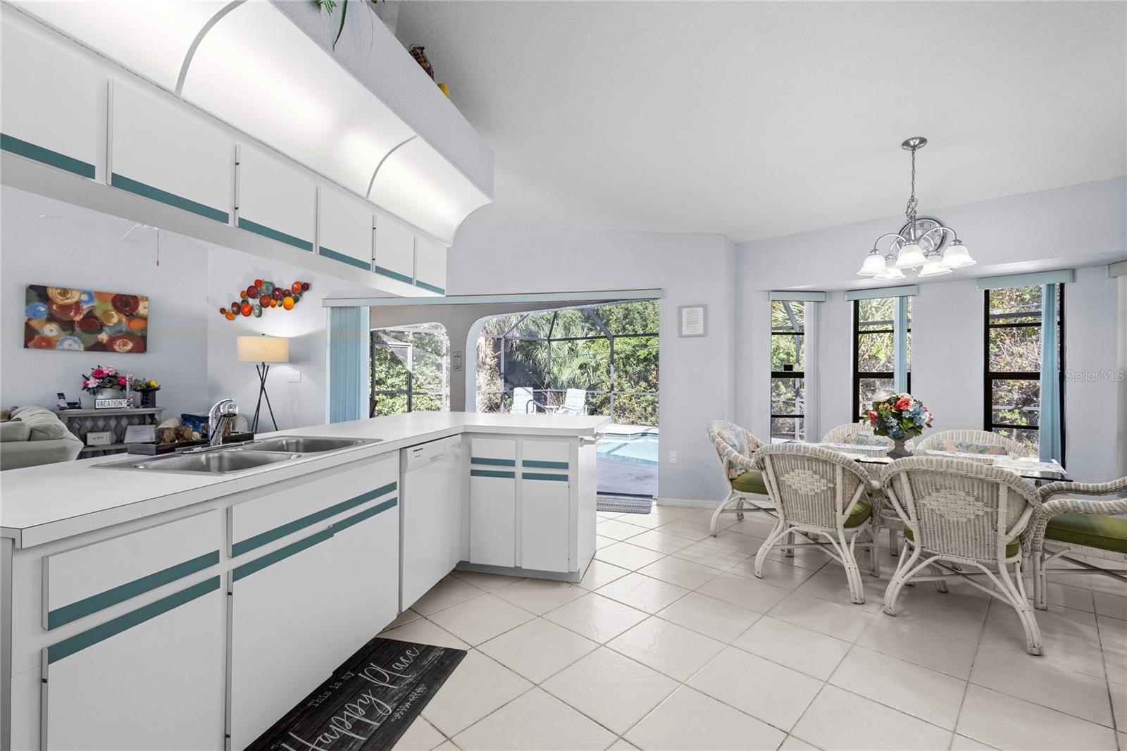 Large Kitchen with view of the pool. Large Kitchen with view of the pool.