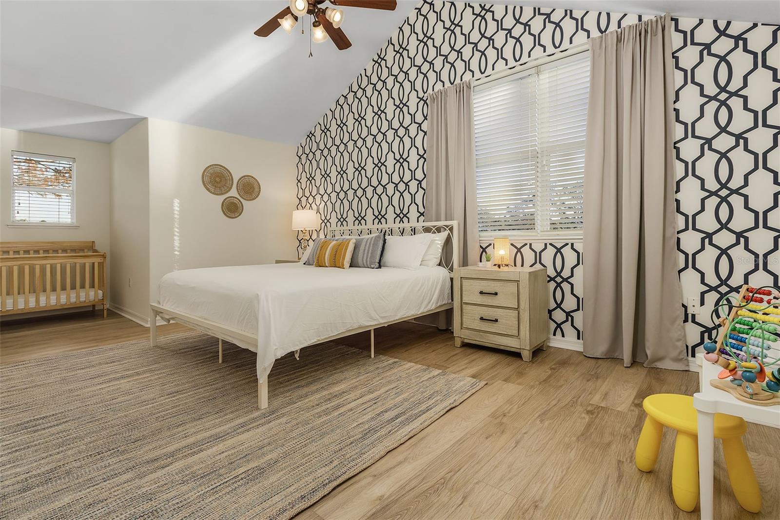 Bedroom 3 or second master with en-suite full bath and grand walk in closet.