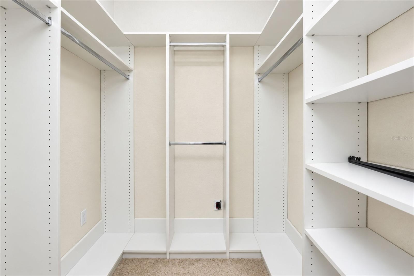 1 of 2 Walk-in Closets in Primary Bedroom