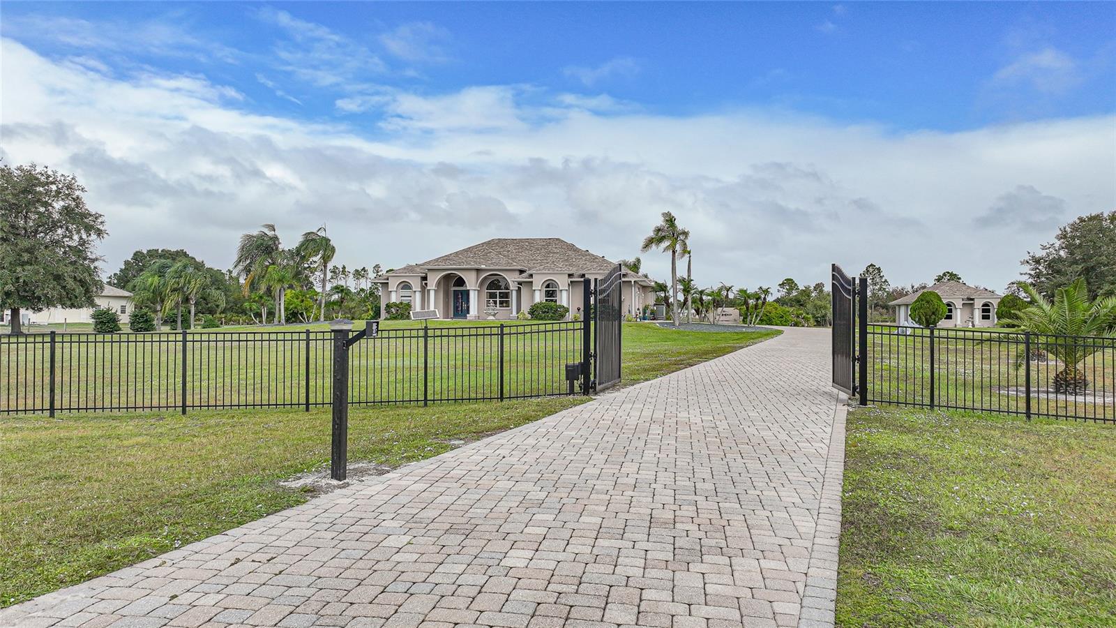 Property is Gorgeous! Secured, Gated Entry with Long, Paver Drive. 5 Car Garage, Pond, Fenced, 6.39 Acres, Shed with Electric and Patio, Equestrian Trails Property is Gorgeous! Secured, Gated Entry with Long, Paver Drive. 5 Car Garage, Pond, Fenced, 6.39 Acres, Shed with Electric and Patio, Equestrian Trails