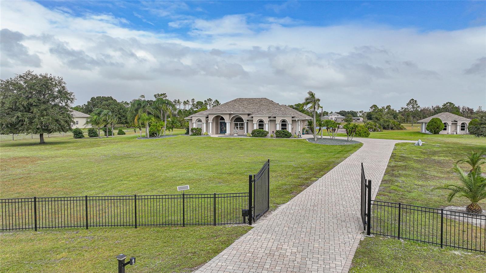 One Owner - Custom Built. Gated Entry, Paver Drive