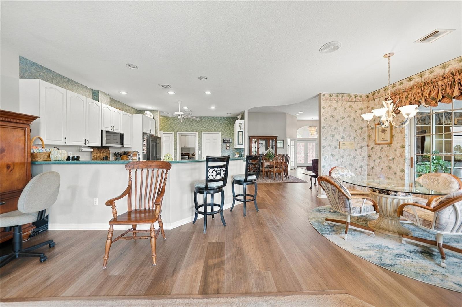 NEW Flooring, Breakfast Bar and Eating Nook with Entrance to Lanai