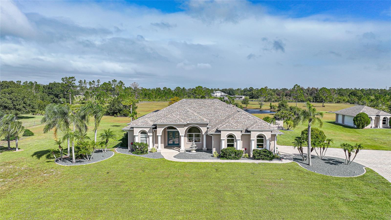 One Owner - Custom Built. Gated Entry, Paver Drive