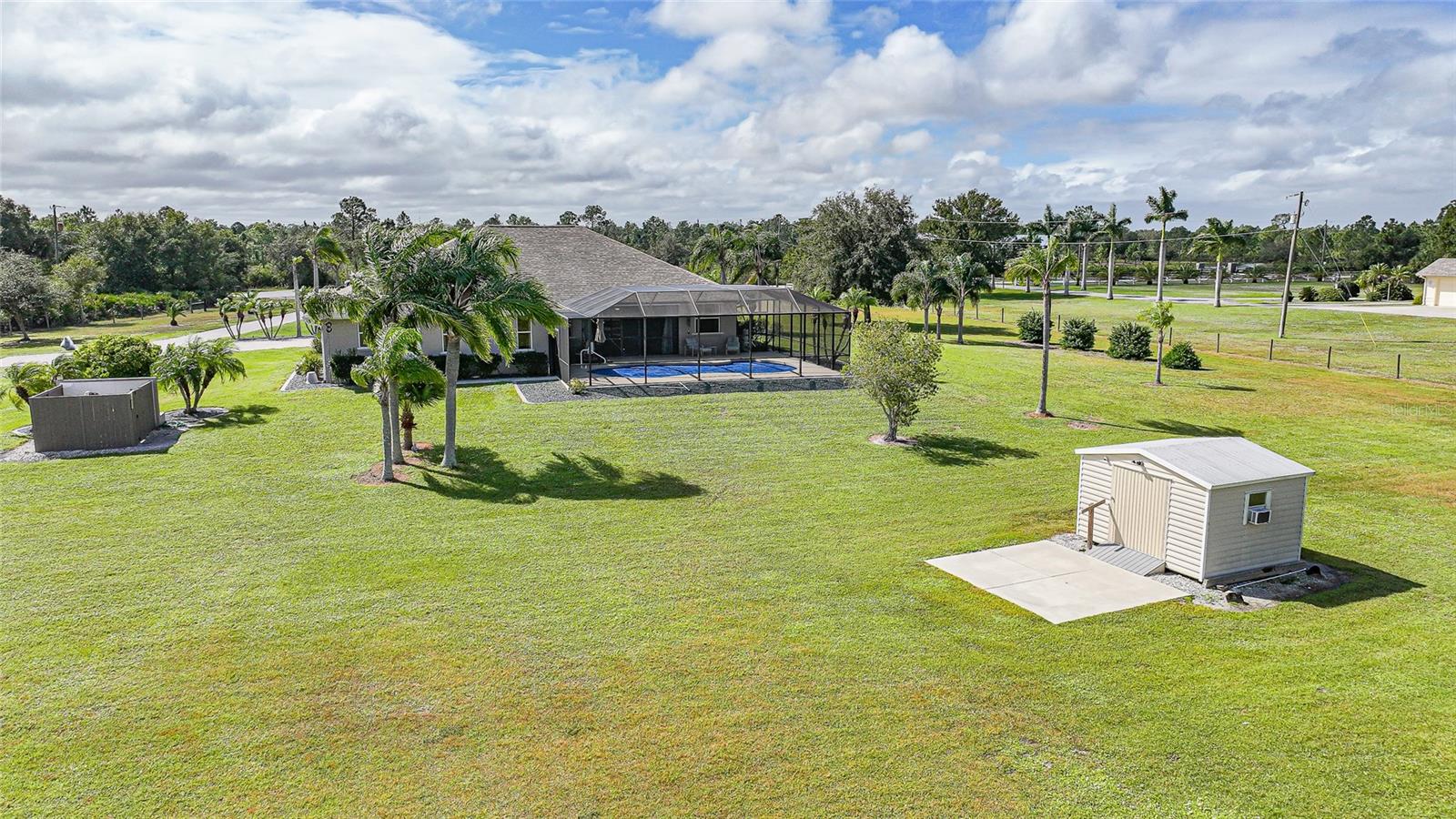 Home with 6.39 Acres, In-Ground Pool, Shed with Patio and Electric