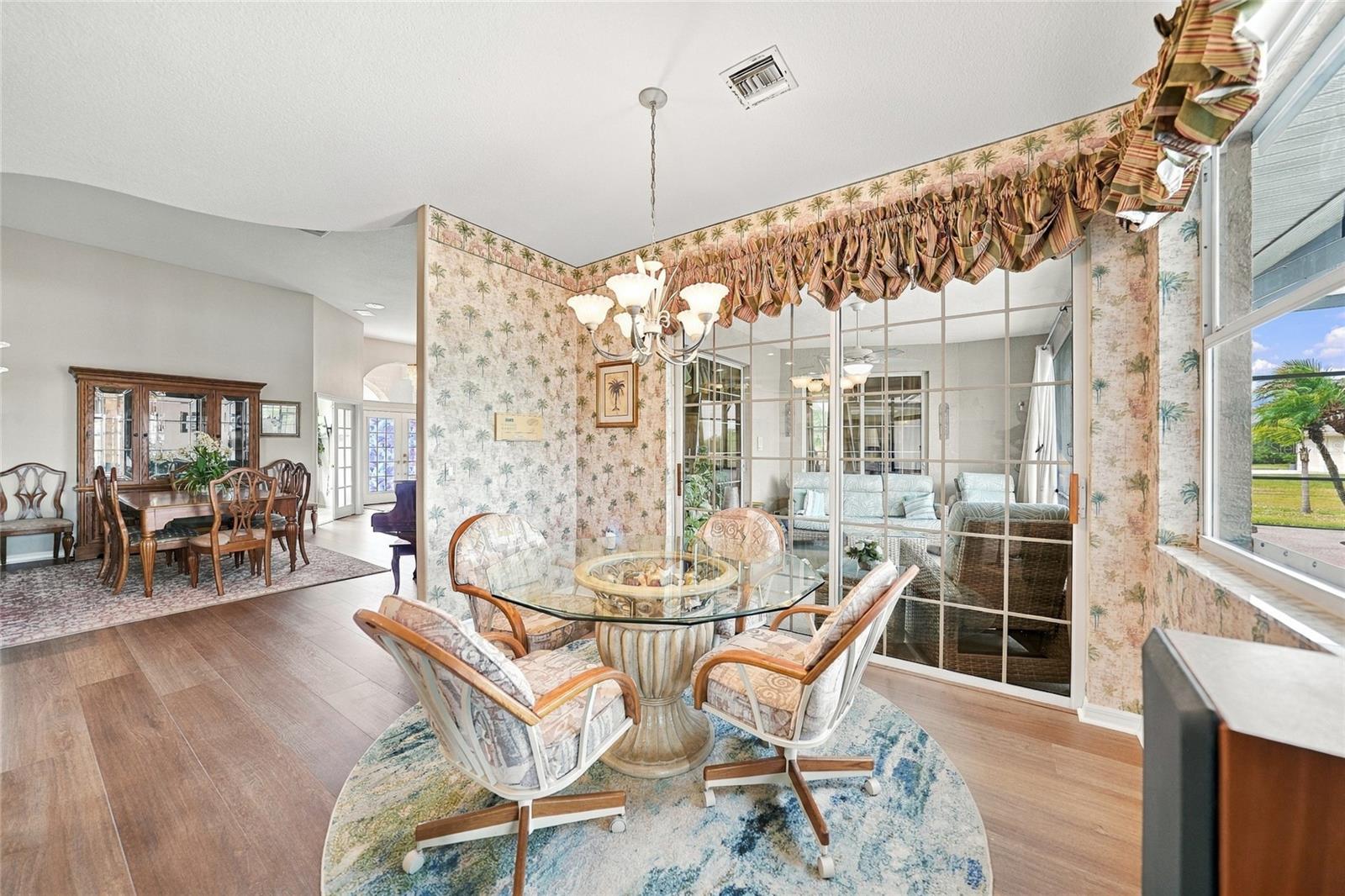 NEW Flooring, Breakfast Bar and Eating Nook with Entrance to Lanai