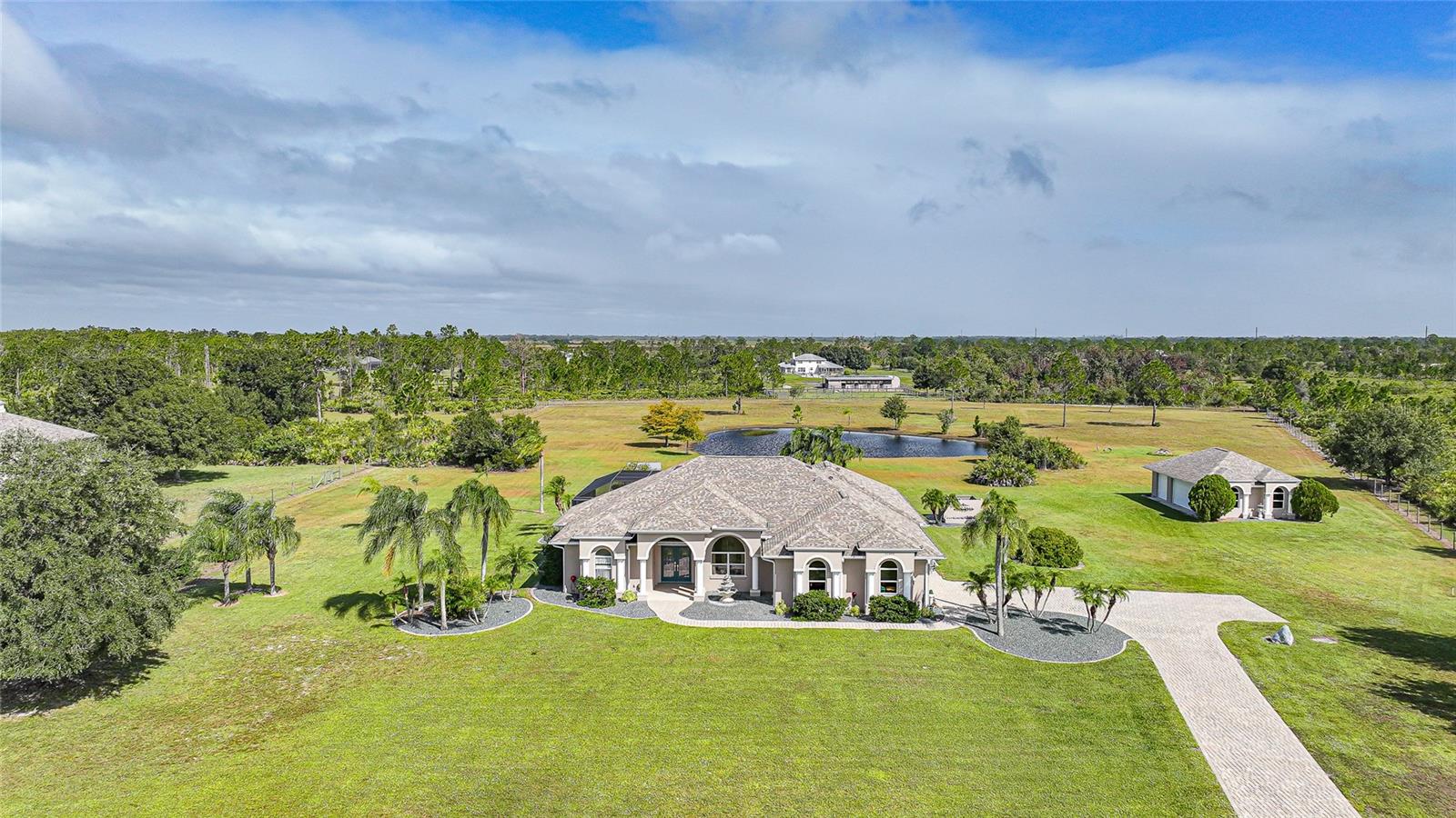 One Owner - Custom Built. Gated Entry, Paver Drive