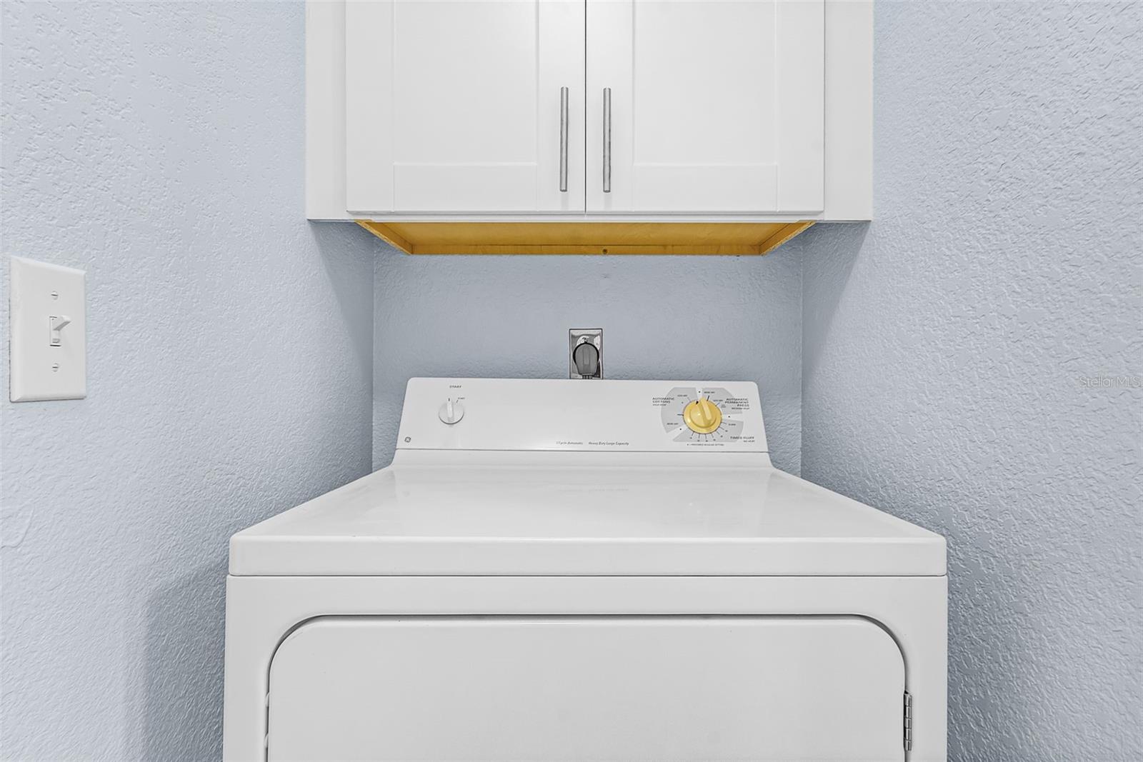 Off the kitchen laundry