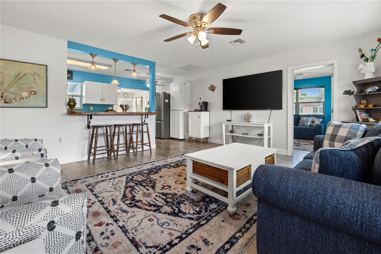 You can see how the floorplan opens into the kitchen, and also the third bedroom/family room.
