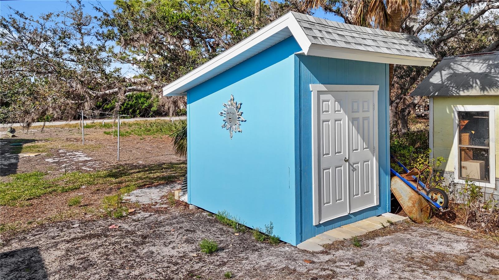 The backyard hosts it's very own storage shed.  Great for tools and garden equipment!