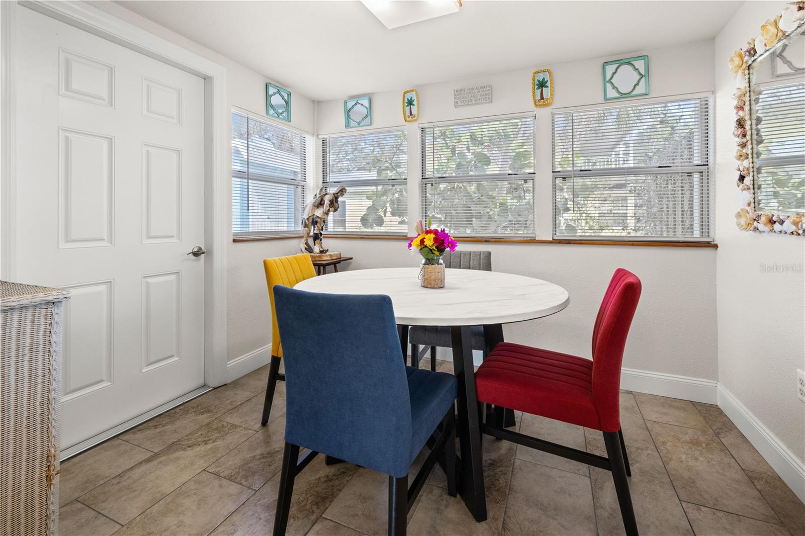 The dining area also opens into the back yard.  It's a peaceful view into the back yard.