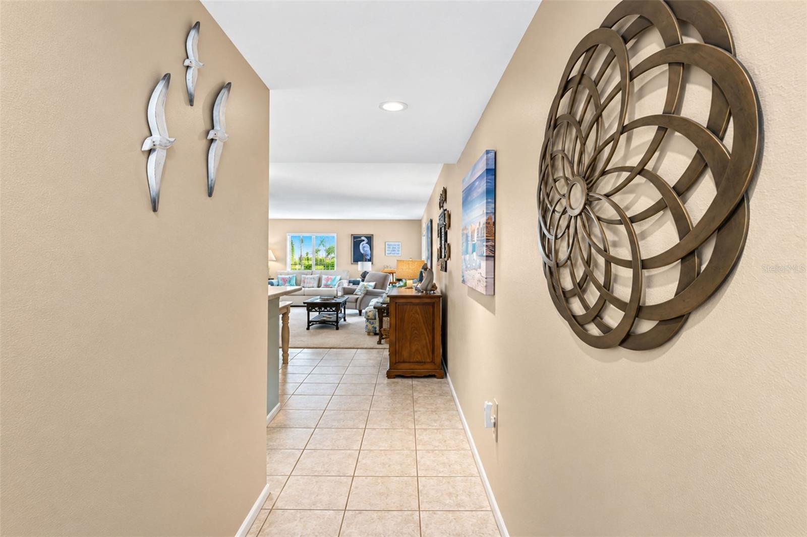 The tiled flooring carries into the kitchen & dining area from the front entry. The tiled flooring carries into the kitchen & dining area from the front entry.