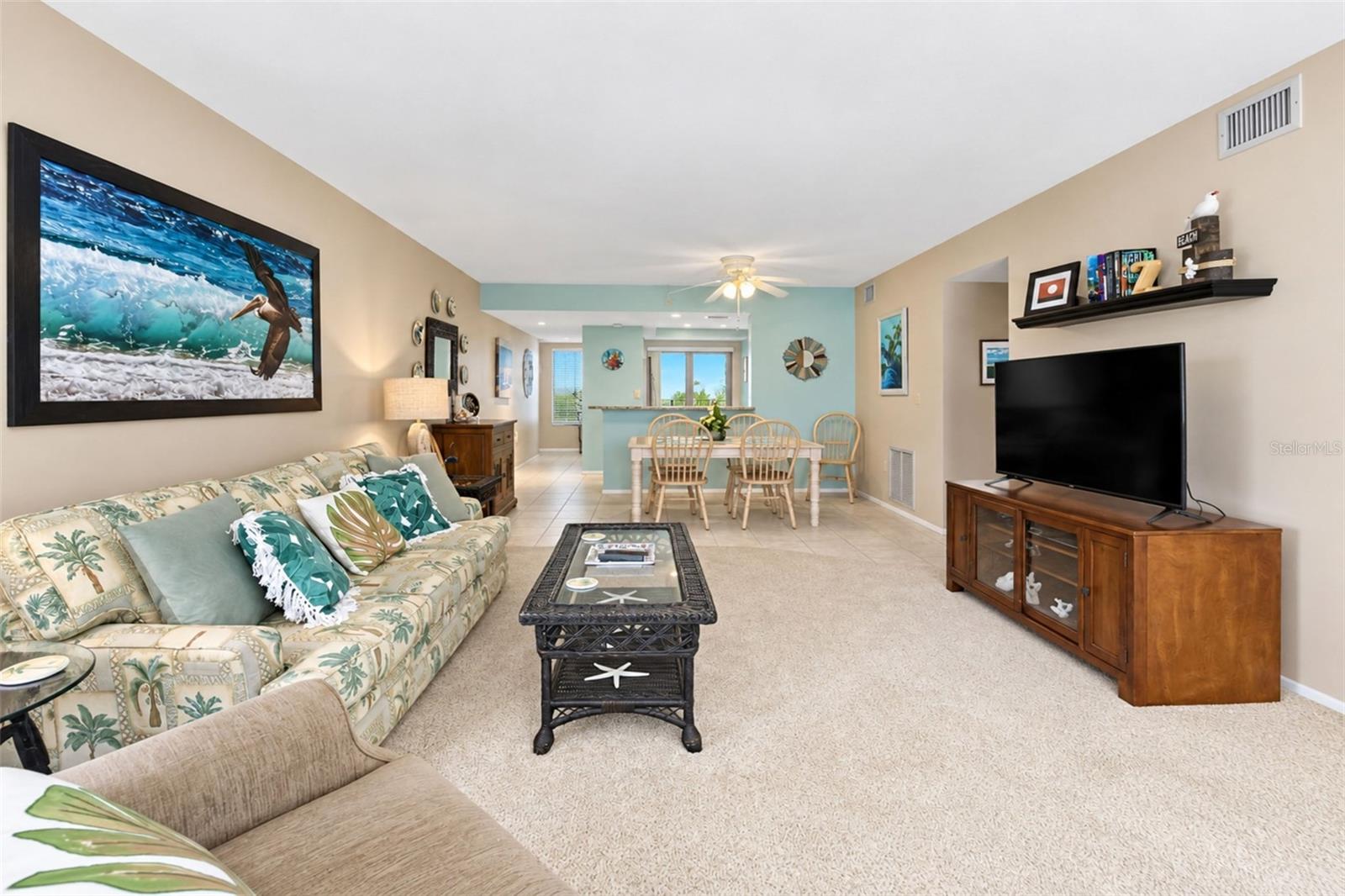 The view of the living & dining area from the lanai. The view of the living & dining area from the lanai.