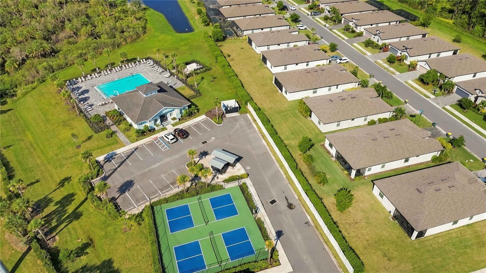 Gated community includes heated pool, pickleball, fitness center, cable tv and internet included.
