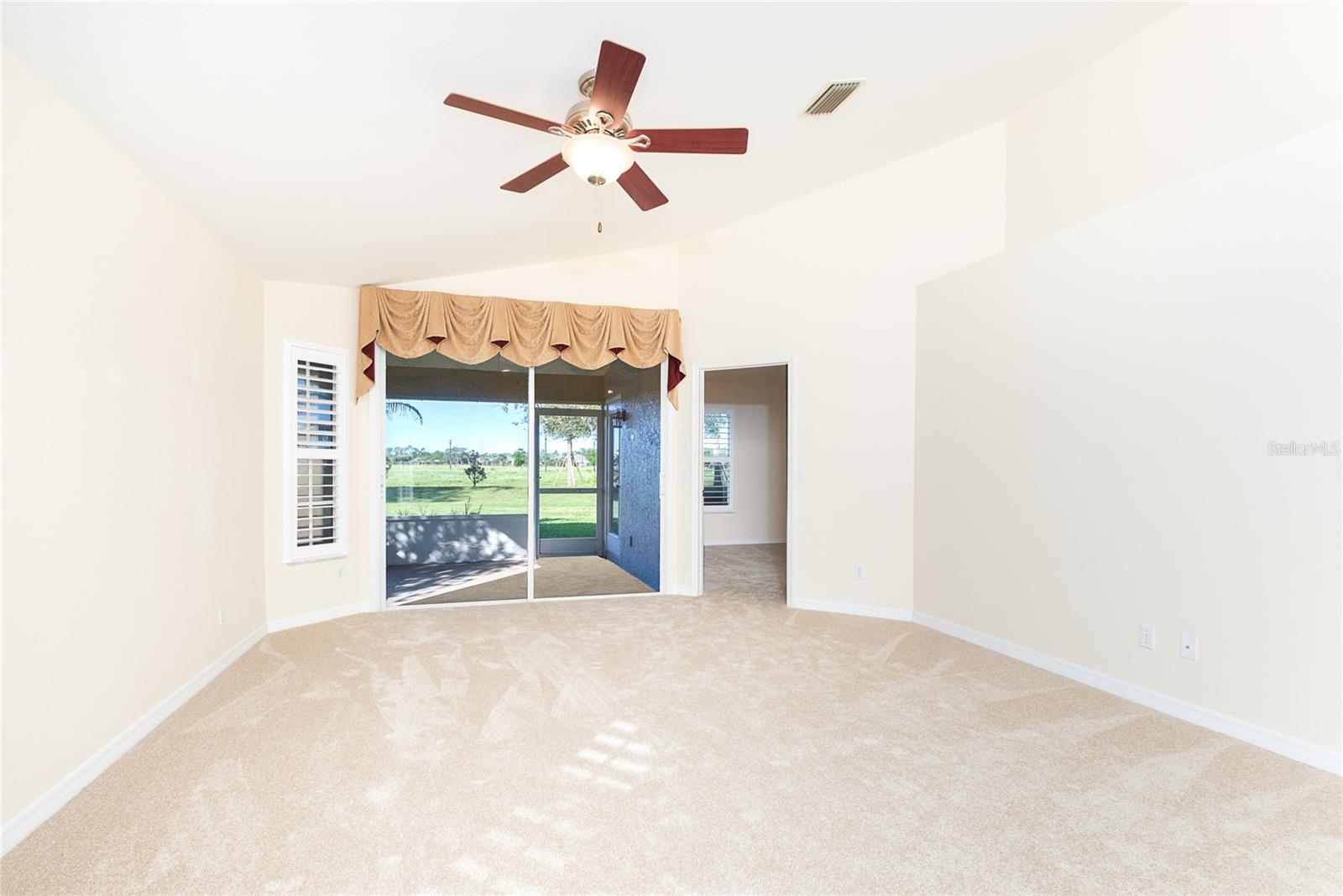 Sliders to the Lanai have Remote Control Shades