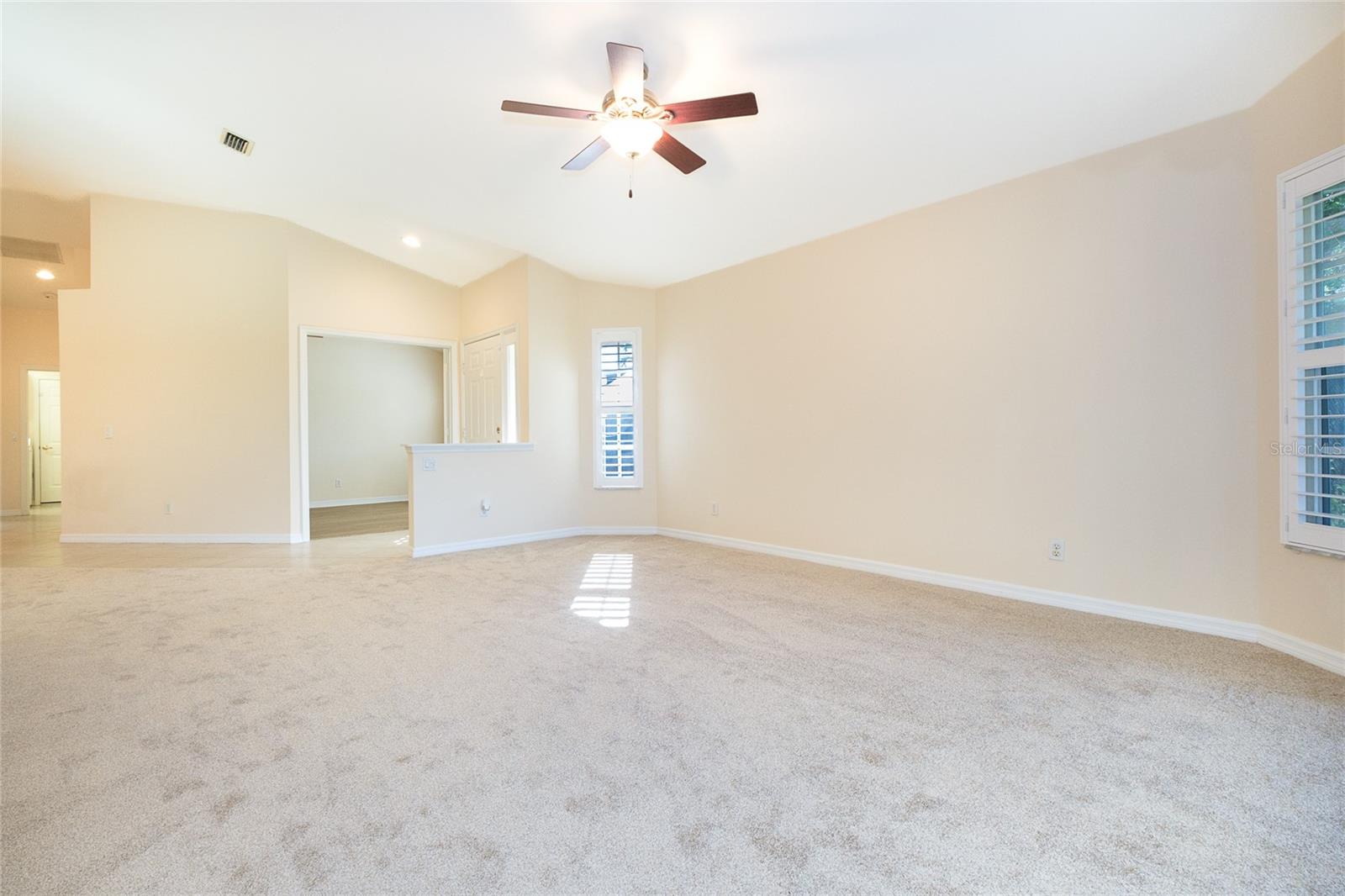 Spacious Living Room with New Carpet