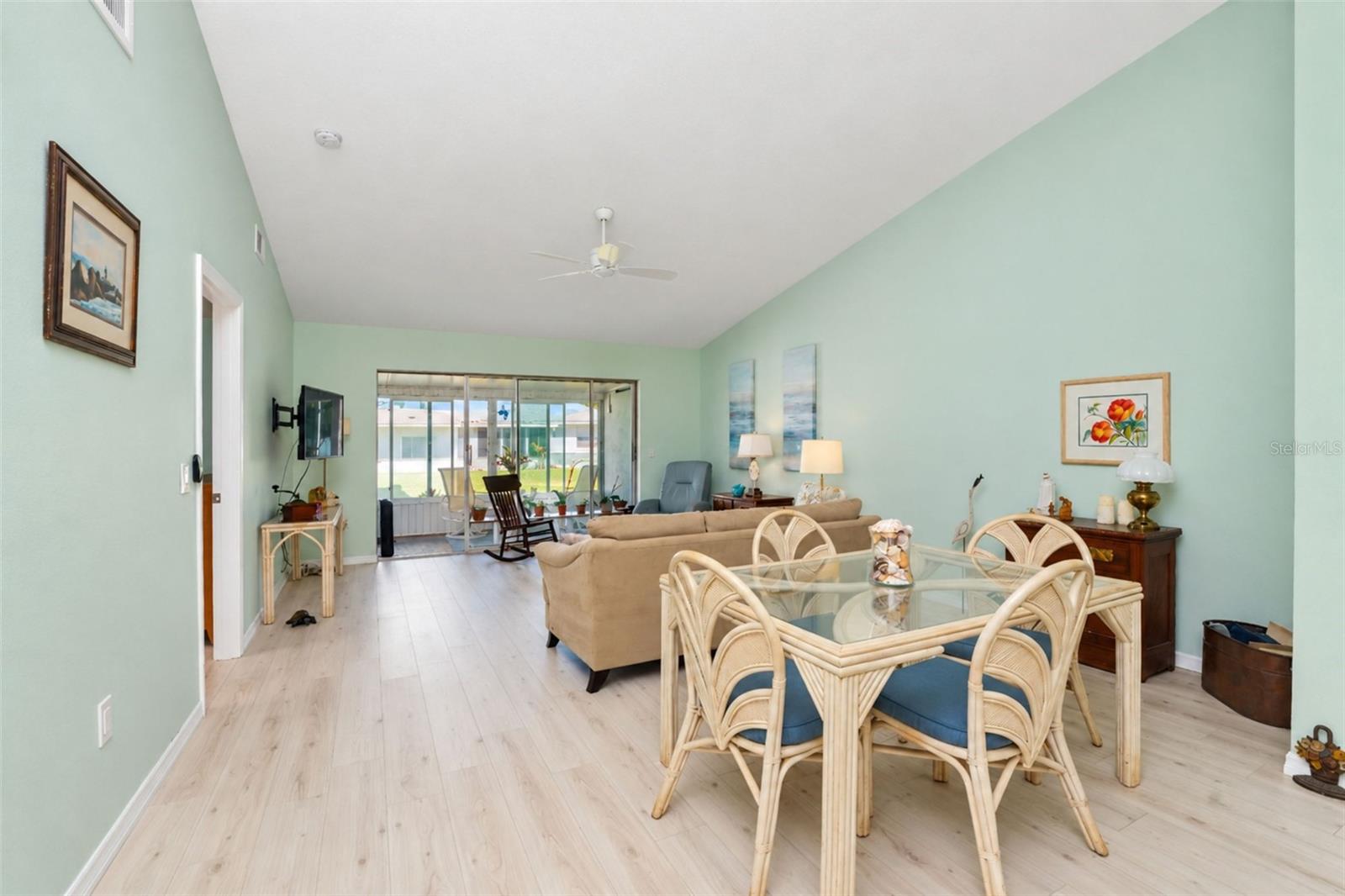 The dining area is conveniently located between the kitchen and living room. The dining area is conveniently located between the kitchen and living room.